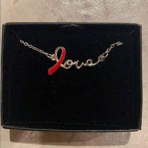 Avon silver love necklace